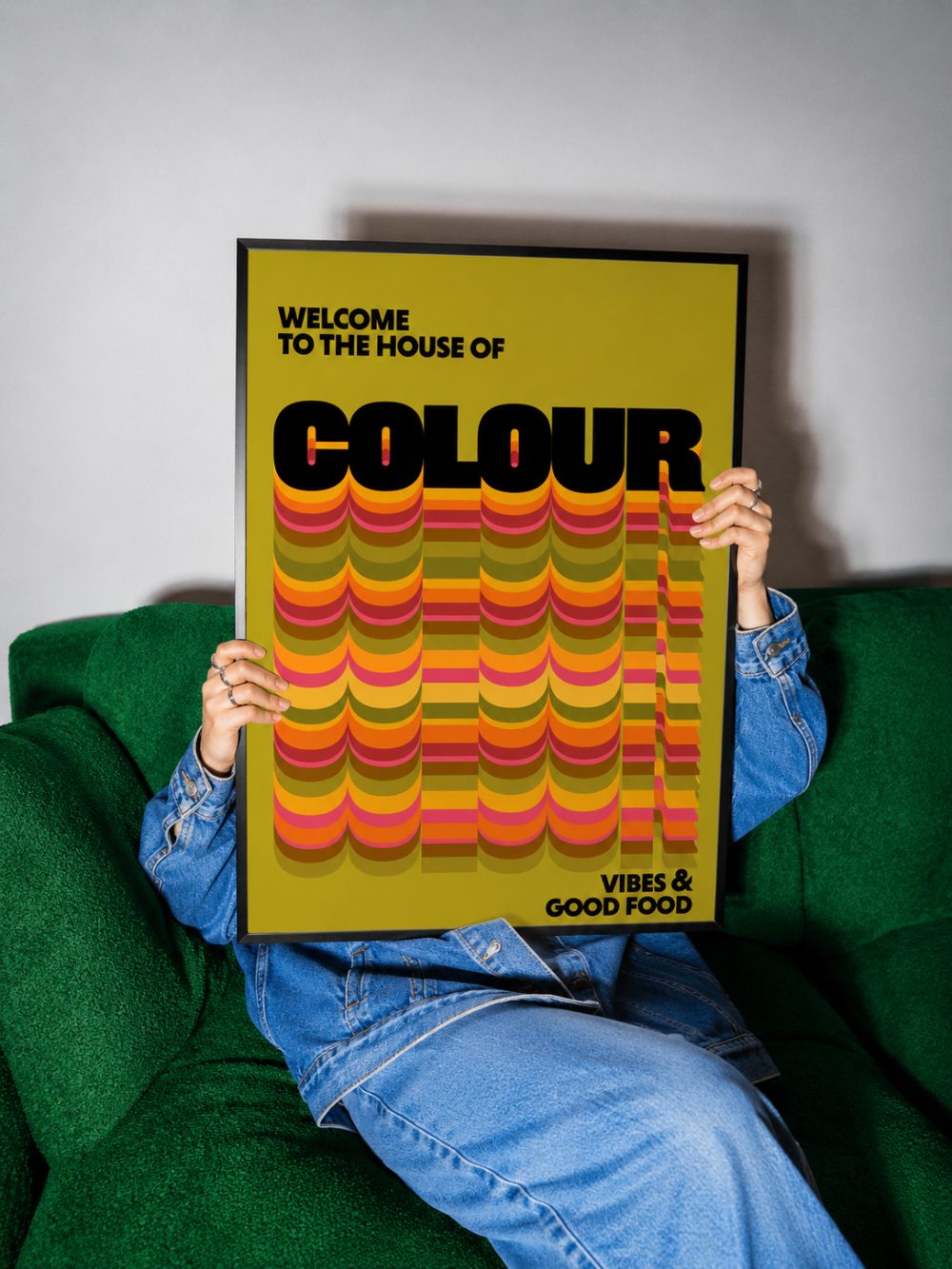 House of Colour print, olive, framed on a green sofa